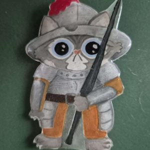 Goofy cat knight pin